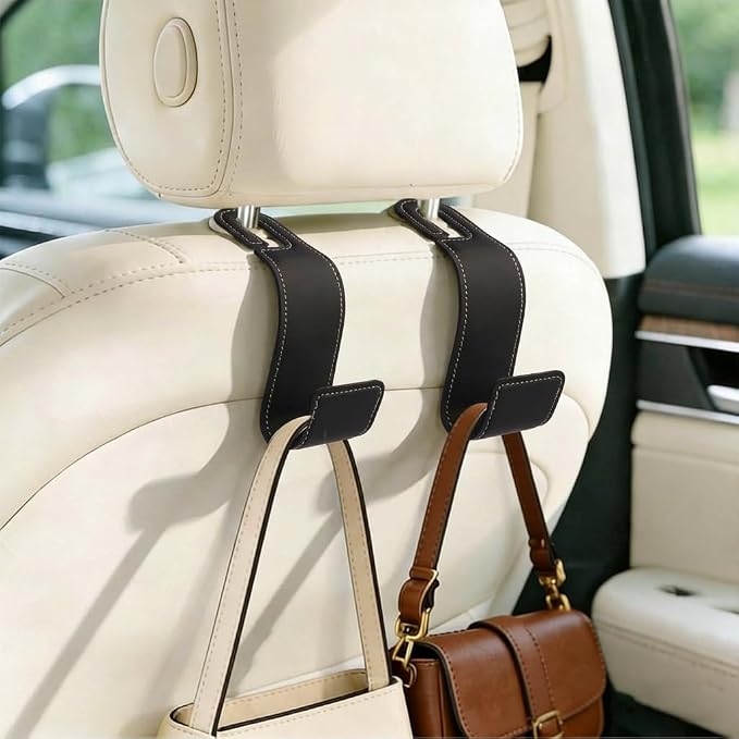 2-Pack Car Headrest Hooks, 1.1-Inch Wide Purse Hangers, Black | Microfiber leather hooks with built-in metal cores keep purses, groceries and backpacks organized and within reach by Unknown